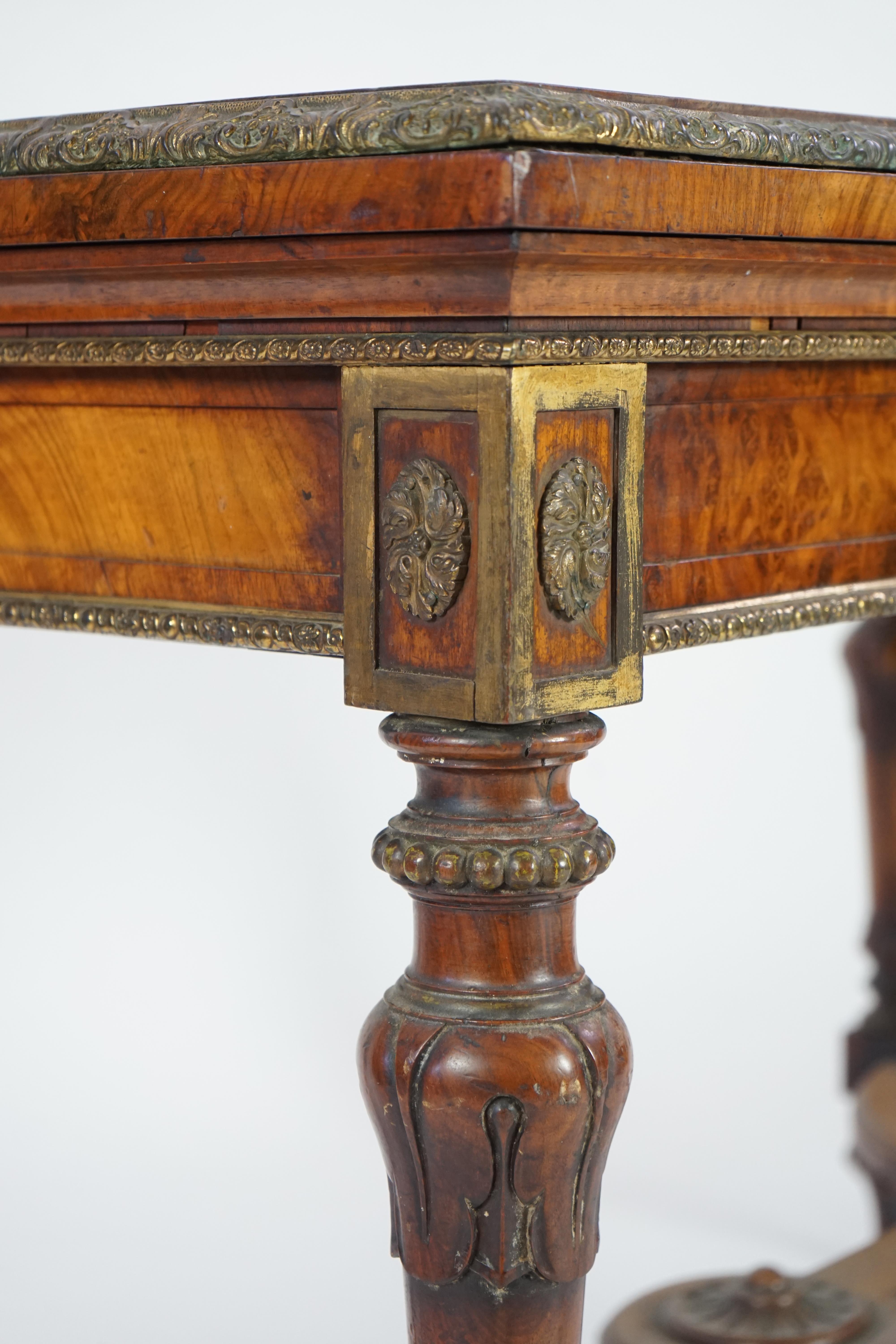 A mid Victorian ormolu mounted walnut pietra dura top centre table